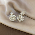 Rose Cluster Clip On Earrings In Two Metallic Tones view 6