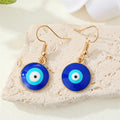 Gold Tone Blue Evil Eye Hook Earrings in Heart and Round Shapes view 3