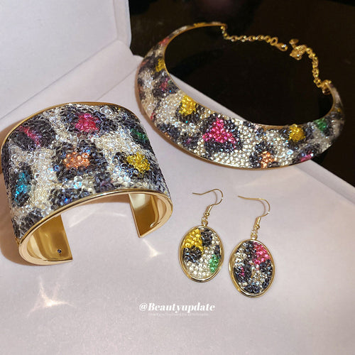 Rhinestone leopard cuff, collar necklace, and oval earrings in box