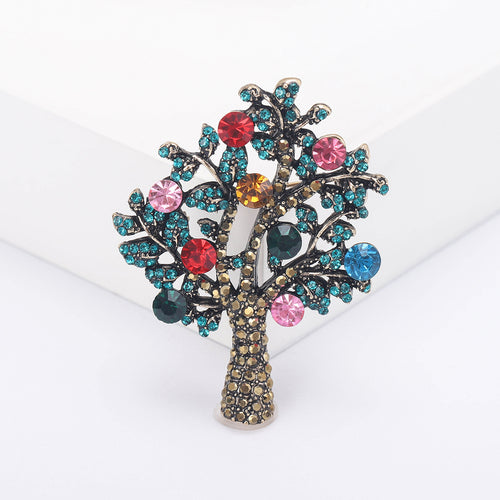 Angled display of branching tree silhouette filled with small faceted leaf stones