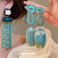 Turquoise Bead Tassel and Resin Drop Earrings in Two Designs view 1