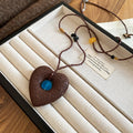 Brown Beaded Heart Necklaces with Blue and White Centers view 6