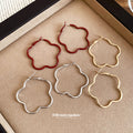 Flower Outline Hoop Earrings in Gold Red and Silver view 2