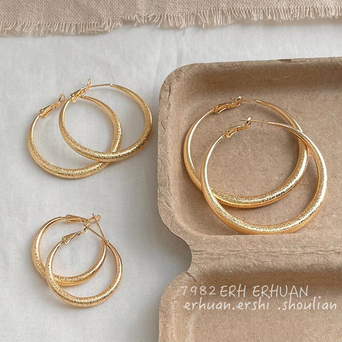 Gold Tone Textured Round Hoop Earrings In Two Graduated Sizes