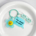 Smiley Daisy Charm Keychain With Speech Bubble Tag And Acrylic Chain view 3