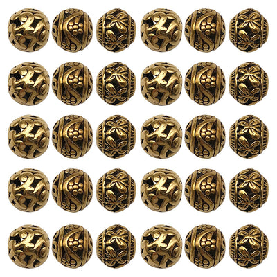 Matte gold-tone spacer bead beads arranged on a light background