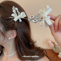 Crystal Bow Duckbill Hair Clip In Pink Or White With Teardrop Fringe view 4