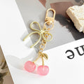 Resin Cherry Pair Charm Keychain with Gold Tone Hardware Accents view 2