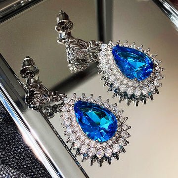 Blue Teardrop Halo Stone Drop Earrings in Silver Tone