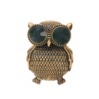 Front product view of the owl brooch pin in gold and green