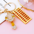 Gold Tone Abacus Keychain with Enamel Ruyi and Crystal Accents view 3