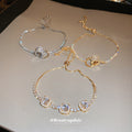 Three Mixed Crystal Slider Bracelets With Cage Or Halo Centers view 1