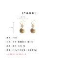 Gold Tone Clear Stone Cross And Iridescent Shell Disc Hook Earrings view 3