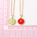 Gold Tone Round Daisy Resin Pendant Necklaces in Six Colors view 5