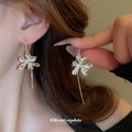 Iris Flower Long Threader Earrings in Silver and Gold Tones view 3