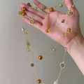Blue Green and Amber Tone Beaded Long Necklace With Polished Metal Details view 3