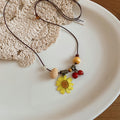 Botanical Cord Pendant Necklaces in Six Floral Designs view 6
