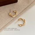 Gold Polished Twisted Ribbon Open Hoop Stud Earrings view 3