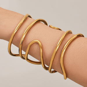 Sculptural Crossing Loop Open Cuff in Gold and Silver Tone
