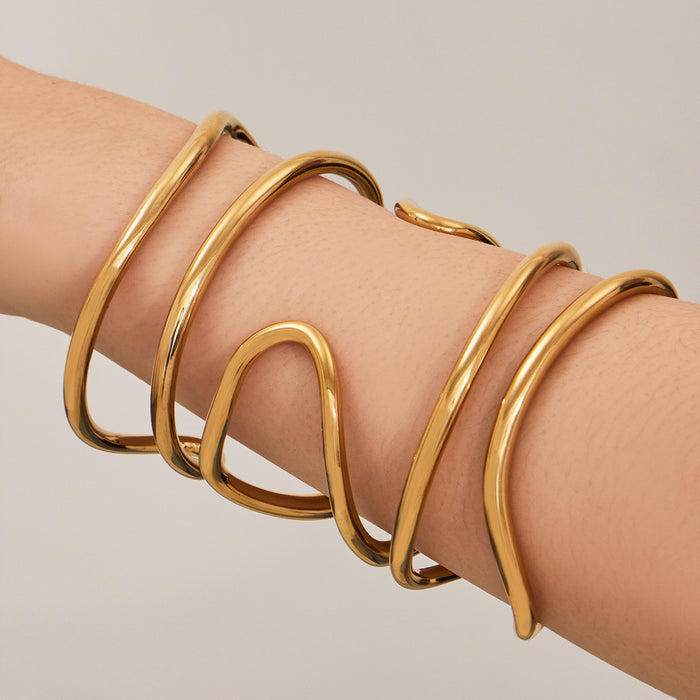 Sculptural Crossing Loop Open Cuff in Gold and Silver Tone