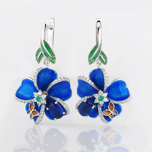 Gold Tone Blue Floral Enamel Drop Earrings with Clear Stone Accents shown in front view