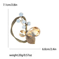 Faceted Glass Flower Brooch with Curved Crystal Stem view 8
