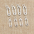 Safety Pin Shaped Charms in Two Sizes and Silver Tone Metal view 1