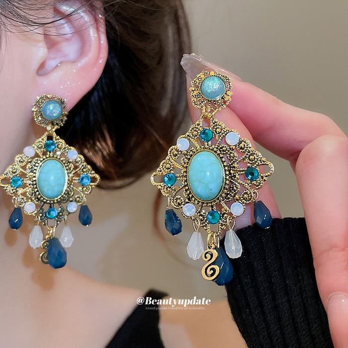 Gold Tone Blue Cabochon And Teardrop Chandelier Earrings