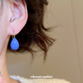 Cobalt Blue Teardrop Hook Earrings with Gold Tone Wires view 3