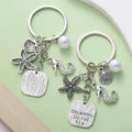 Silver-Tone Ocean Charm Keychain With Starfish, Seahorse, Shell And White Bead view 1