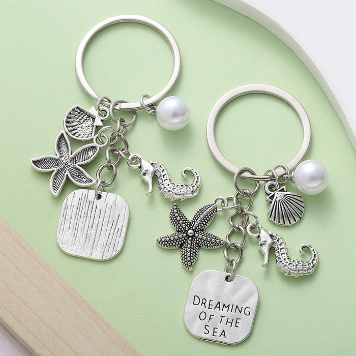 Silver-Tone Ocean Charm Keychain With Starfish, Seahorse, Shell And White Bead