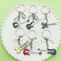 Guitar, Microphone and Saxophone Charm Keychains in 11 Pictured Variations view 4