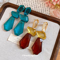 Geometric Resin Drop Earrings in Amber and Teal Blue view 2