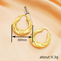 Rounded Ribbed Hoop Earrings in Silver and Gold Tones view 4