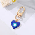 Gold Tone Blue Evil Eye Heart Round and Teardrop Clip Keychains view 2