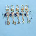 Gold-Tone Rhinestone Evil Eye Charm With Letter Cutout Pendant view 4
