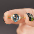 Gold Tone Teal Oval Stone Side Baguette Ring Sizes 6-10 view 2