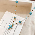 Blue Bead Cross Pendant Necklace with Gold Tone Chain view 4