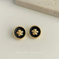 Black Enamel Gold Camellia Round Clip Stud Earrings view 4