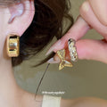 Twisted C Hoop Earrings in Mixed Gold and Silver Tones view 2