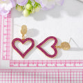 Gold Tone Crystal Open Heart Drop Stud Earrings in Two Colors view 3