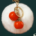 Twin Persimmon Plush Pom Keychains in Fifteen Listed Loop Colors view 2