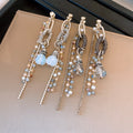 Blue Crystal Chain Tassel Earrings In Two Silver Tone Styles view 1