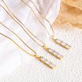 Gold Tone Three Stone Vertical Baguette Pendant Necklace view 2