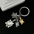 Silver Tone Turtle Family and Starfish Keychain with Metal Hardware view 2