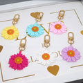 Gold Tone Colorful Daisy Clip Keychains in Six Colors view 2
