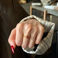 Gold Tone Open Ring Red Oval Halo Clear Border Stones view 2