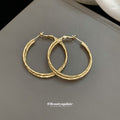 Textured Gold Tone Medium Round Hoop Earrings Jewelry view 4