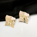 Gold and Silver Rippled Square Geometric Stud Earrings view 6