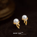 Gold Pearl Bow Stud Earrings Clear Crystal Accent Pair view 1